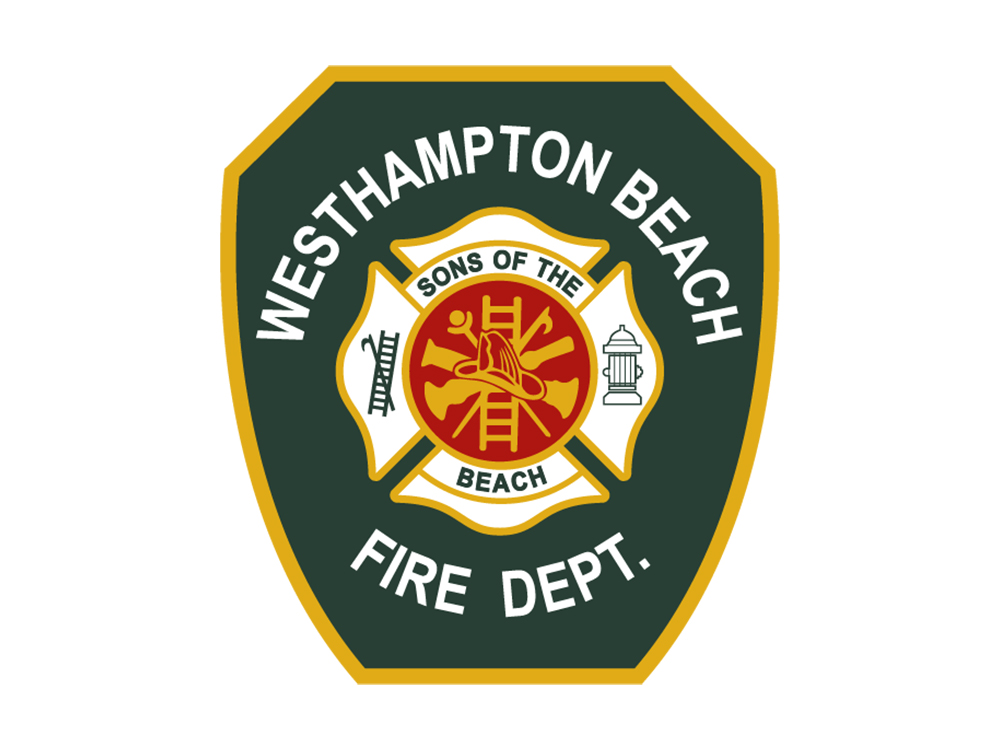 A green, gold, and white fire department badge with "Westhampton Beach Fire Dept." and a central emblem featuring fire tools, "Sons of the Beach," and images of a hydrant and ladder.